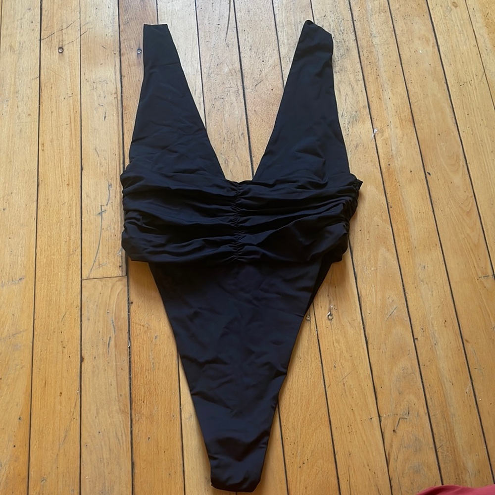 Never been worn riot swim bathing suit size large